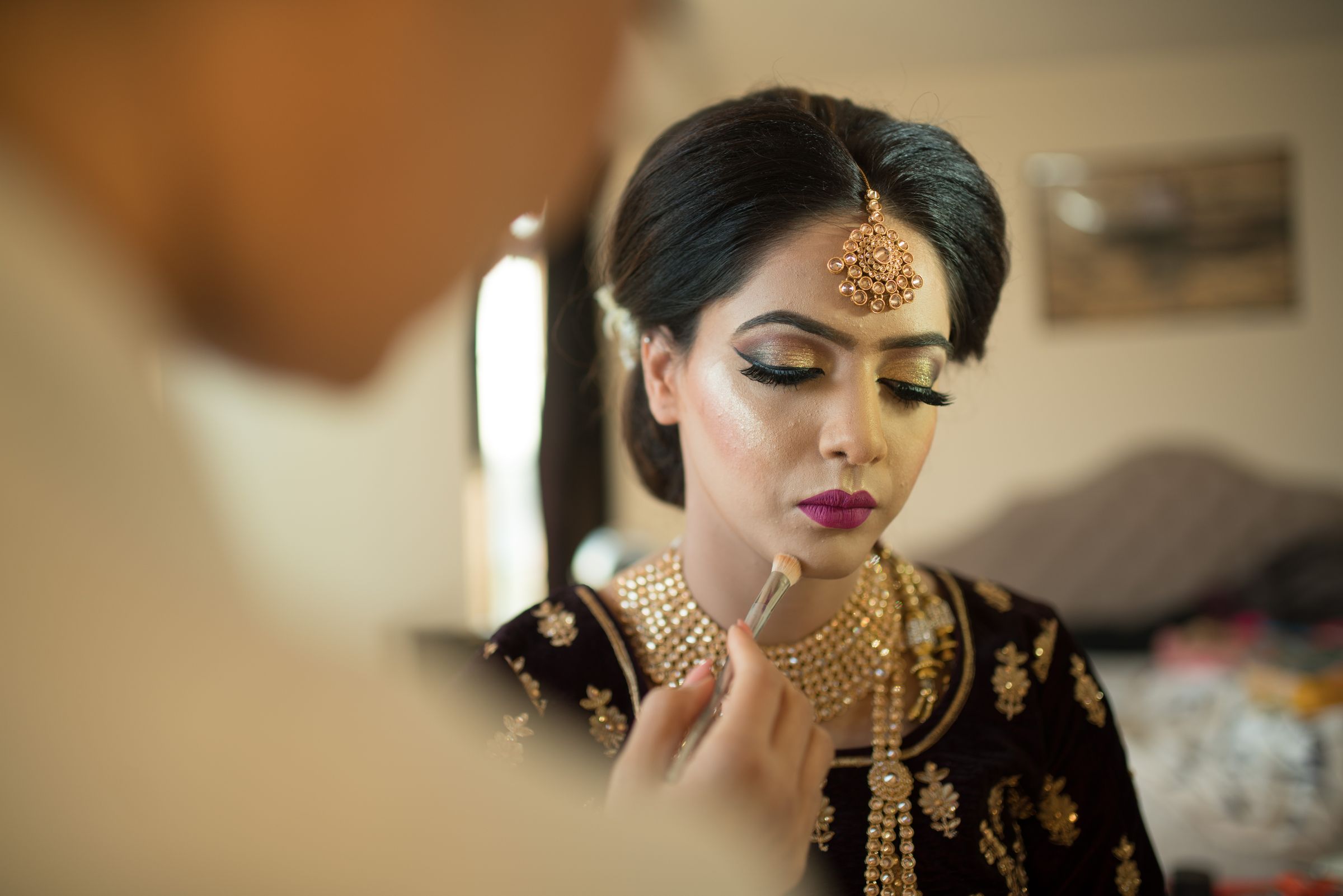 Bridal makeup being applied at Beena's Beauty Salon, Mangaluru